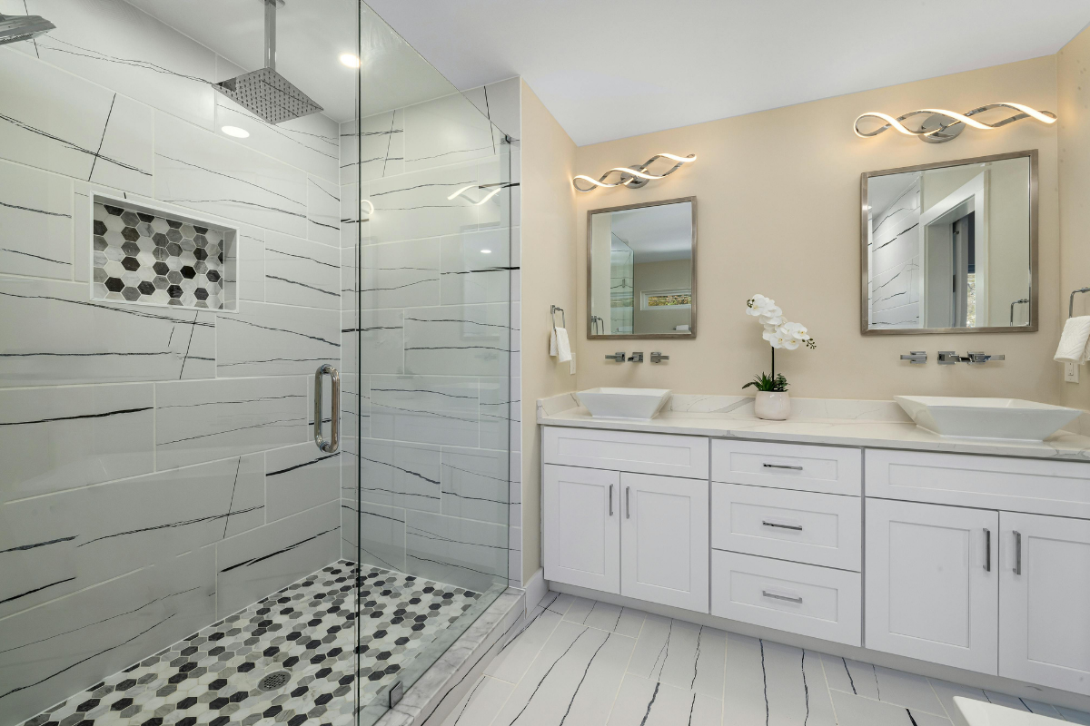 Luxury walk-in shower with custom tile and built-in bench